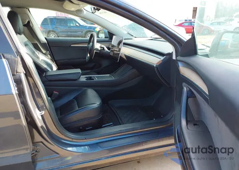 2021 Tesla Model 3 Standard Range Plus Rear-Wheel Drive from USA, damaged, VIN 5YJ3E1EAXMF095146